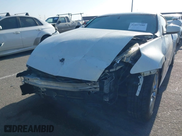 2014 Nissan 370Z Touring with VIN JN1AZ4EH7EM635655, listed as a IAAI auction lot 42217280 with 150,200 mi miles and . Bid and sale history available at DreamBid. Image 6.