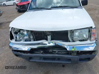 2000 Nissan Frontier XE z VIN 1N6DD21S4YC386902, wystawiony jako IAAI lot #42197752 z przebiegiem 164 055 mil mil oraz . Historia ofert i sprzedaży dostępna na DreamBid. Obrazek 6.