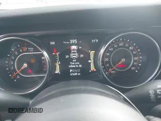 2020 Jeep Wrangler Unlimited Freedom with VIN 1C4HJXDG5LW282721, listed as a IAAI auction lot 42268956 with 47,245 mi miles and . Bid and sale history available at DreamBid. Image 7.