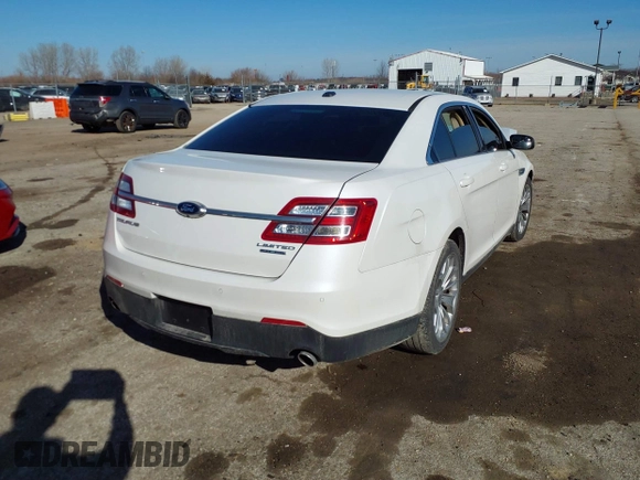 2014 Ford Taurus Limited with VIN 1FAHP2F89EG155934, listed as a IAAI auction lot 41760703 with 130,280 mi miles. Bid and sale history available at carsss.com. Image 4.
