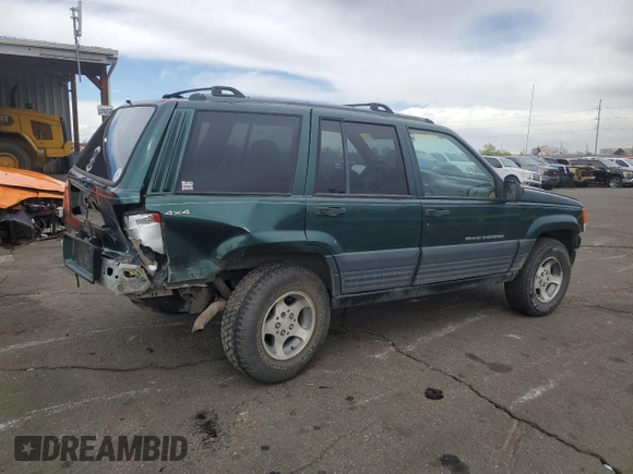 1996 Jeep Grand Cherokee Laredo with VIN 1J4GZ58S6TC165636, listed as a Copart auction lot 51485235 with 266,873 mi miles and Salvage Title. Bid and sale history available at carsss.com. Image 3.