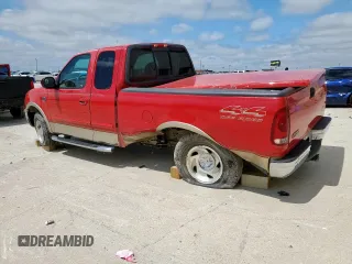 2000 Ford F-150 XL with VIN 1FTRX18L7YKB03018, listed as a Copart auction lot 56104045 with Not provided miles and Salvage title. Bid and sale history available at DreamBid. Image 2.