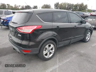 2013 Ford Escape SE with VIN 1FMCU0GX4DUA34229, listed as a IAAI auction lot 42358941 with 141,492 mi miles and . Bid and sale history available at DreamBid. Image 4.