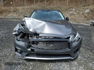 2019 Infiniti Q50 Luxe with VIN JN1EV7AR7KM557600, listed as a Copart auction lot 52033465 with 48,542 mi miles and Salvage title. Bid and sale history available at DreamBid. Image 5.