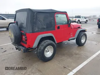 2006 Jeep Wrangler SE with VIN 1J4FA29156P762295, listed as a IAAI auction lot 41669950 with 163,492 mi miles and . Bid and sale history available at DreamBid. Image 4.