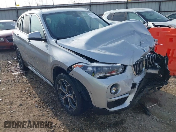 2019 BMW X1 sDrive28i z VIN WBXHU7C52K3H44360, wystawiony jako IAAI lot #41709431 z przebiegiem 56 432 mil mil oraz . Historia ofert i sprzedaży dostępna na DreamBid. Obrazek 1.