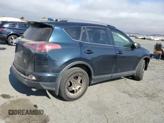 2017 Toyota RAV4 LE with VIN JTMBFREVXHJ146587, listed as a Copart auction lot 64794935 with 92,192 mi miles and Salvage title. Bid and sale history available at DreamBid. Image 3.