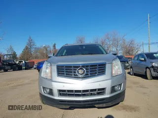 2013 Cadillac SRX Performance Collection z VIN 3GYFNHE33DS540108, wystawiony jako IAAI lot #42061957 z przebiegiem 182 797 mil mil oraz . Historia ofert i sprzedaży dostępna na DreamBid. Obrazek 12.