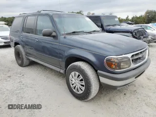 1998 Ford Explorer XLT with VIN 1FMZU32P0WUD21265, listed as a Copart auction lot 73702364 with 211,096 mi miles and Salvage title. Bid and sale history available at DreamBid. Image 4.