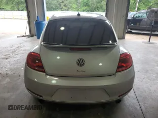 2012 Volkswagen Beetle with VIN 3VWV67AT1CM663839, listed as a Copart auction lot 55009455 with 122,042 mi miles and Salvage Title. Bid and sale history available at DreamBid. Image 6.