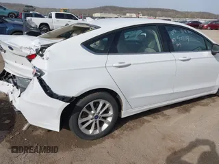 2020 Ford Fusion Hybrid SE with VIN 3FA6P0LU7LR201375, listed as a IAAI auction lot 41815488 with 70,670 mi miles. Bid and sale history available at carsss.com. Image 4.