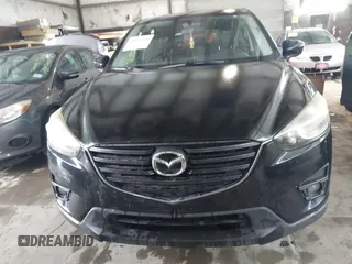 2016 Mazda CX-5 Grand Touring with VIN JM3KE4DY5G0816575, listed as a IAAI auction lot 42101340 with 180,762 mi miles and . Bid and sale history available at carsss.com. Image 12.