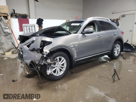 2014 Infiniti QX70 z VIN JN8CS1MW5EM412429, wystawiony jako Copart lot #82933934 z przebiegiem Nie podano mil oraz Szkoda całkowita • Salvage title. Historia ofert i sprzedaży dostępna na DreamBid. Obrazek 1.