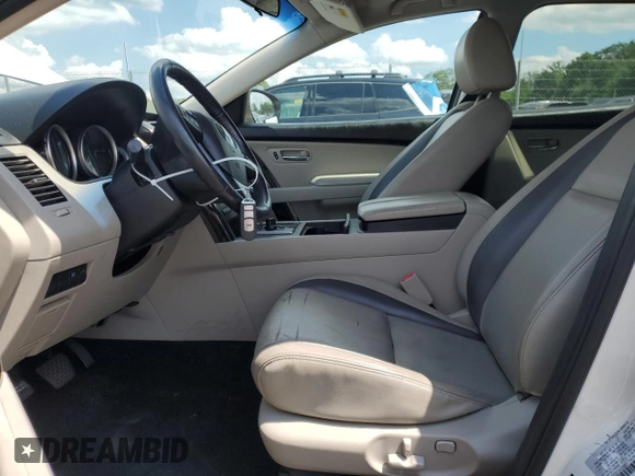 2012 Mazda CX-9 Touring with VIN JM3TB3CV2C0338611, listed as a Copart auction lot 61193625 with 115,817 mi miles and Salvage title. Bid and sale history available at DreamBid. Image 7.