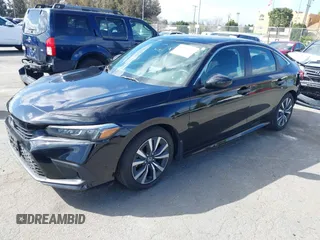 2023 Honda Civic Sedan EX with VIN 2HGFE1F75PH324493, listed as a IAAI auction lot 41692213 with 14,026 mi miles. Bid and sale history available at carsss.com. Image 2.