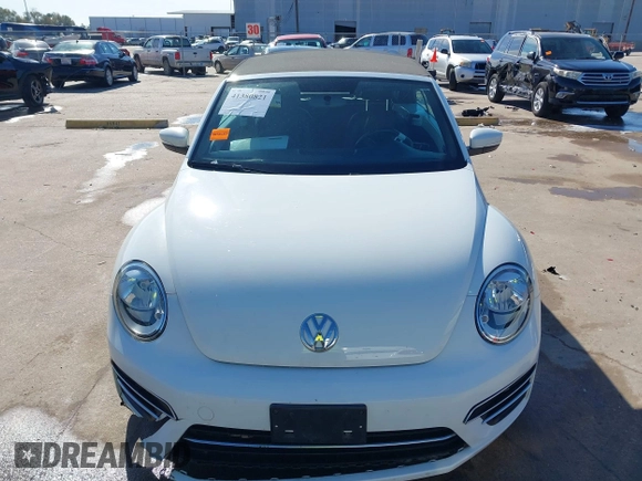 2019 Volkswagen Beetle S with VIN 3VW5DAAT0KM507437, listed as a IAAI auction lot 41380821 with 28,010 mi miles and . Bid and sale history available at DreamBid. Image 12.
