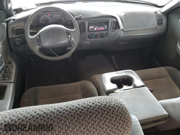 2001 Ford F-150 XLT с VIN 1FTRW07L01KA04562, выставлен на аукционе Copart как лот 52741935 с пробегом 288 598 миль миль и Списание • Salvage title. История ставок и продаж доступна на DreamBid. Изображение 8.