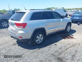 2011 Jeep Grand Cherokee 70th Anniversary with VIN 1J4RR4GG8BC515170, listed as a IAAI auction lot 42135654 with 208,638 mi miles. Bid and sale history available at carsss.com. Image 4.