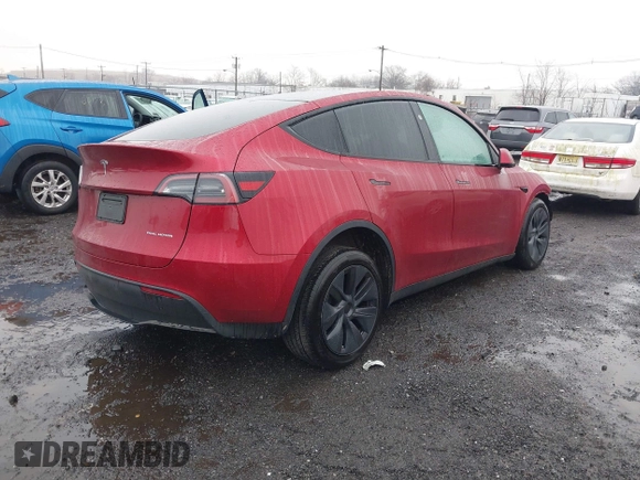 2024 Tesla Model Y Long Range with VIN 7SAYGAEE7RF133073, listed as a IAAI auction lot 41081463 with Not Provided miles and . Bid and sale history available at DreamBid. Image 4.