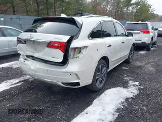 2019 Acura MDX Sport Hybrid w/Advance Pkg with VIN 5J8YD7H77KL000596, listed as a IAAI auction lot 41540974 with 89,378 mi miles. Bid and sale history available at carsss.com. Image 4.