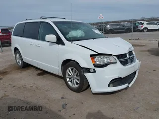 2018 Dodge Grand Caravan SXT with VIN 2C4RDGCG2JR283490, listed as a IAAI auction lot 41796929 with 157,836 mi miles and . Bid and sale history available at DreamBid. Image 1.