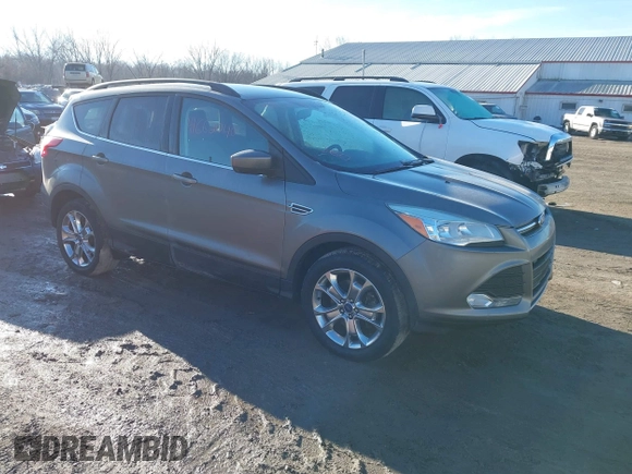 2014 Ford Escape SE z VIN 1FMCU9GXXEUB99093, wystawiony jako IAAI lot #41662040 z przebiegiem 120 783 mil mil oraz . Historia ofert i sprzedaży dostępna na DreamBid. Obrazek 1.