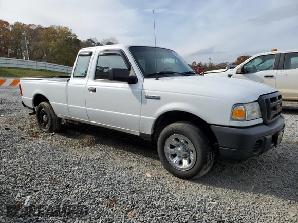2010 Ford Ranger with VIN 1FTLR1EE1APA37032, listed as a Copart auction lot 82587614 with 215,440 mi miles and Salvage Title. Bid and sale history available at DreamBid. Image 4.