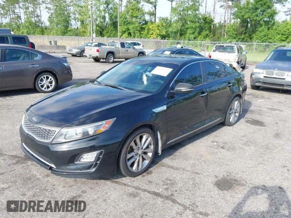 2015 Kia Optima EX with VIN KNAGN4AD7F5090393, listed as a IAAI auction lot 42632332 with 205,227 mi miles and . Bid and sale history available at DreamBid. Image 2.