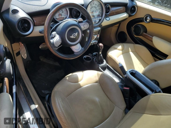 2009 MINI Hardtop S with VIN WMWMF73529TW81190, listed as a Copart auction lot 54172195 with 83,841 mi miles and Salvage Title. Bid and sale history available at DreamBid. Image 8.