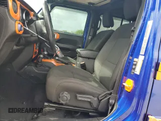 2020 Jeep Wrangler Unlimited Sport S with VIN 1C4HJXDG5LW174535, listed as a Copart auction lot 60888885 with 64,824 mi miles and Salvage title. Bid and sale history available at DreamBid. Image 7.