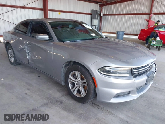 2015 Dodge Charger SE with VIN 2C3CDXBG1FH840060, listed as a IAAI auction lot 42111676 with 165,479 mi miles and . Bid and sale history available at carsss.com. Image 1.