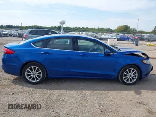 2017 Ford Fusion SE z VIN 3FA6P0H78HR195208, wystawiony jako IAAI lot #40384232 z przebiegiem 166 927 mil mil oraz . Historia ofert i sprzedaży dostępna na DreamBid. Obrazek 13.