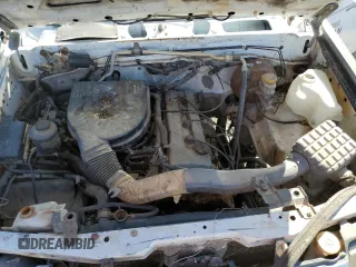 1998 Nissan Frontier XE with VIN 1N6DD21S9WC357098, listed as a Copart auction lot 77652604 with Not provided miles and Clean title. Bid and sale history available at DreamBid. Image 11.