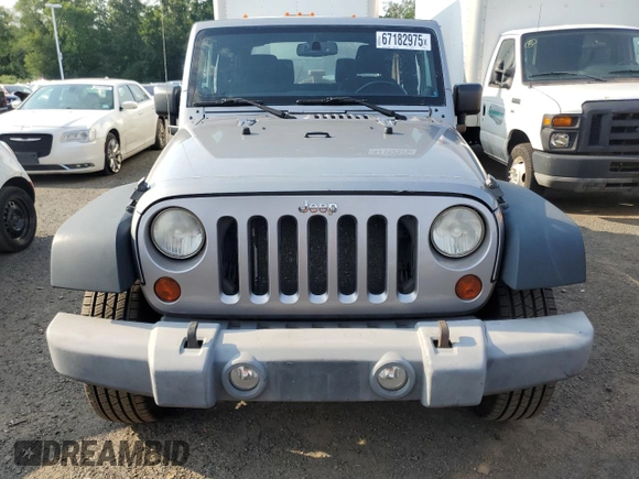 2013 Jeep Wrangler Sport with VIN 1C4AJWAG7DL635639, listed as a Copart auction lot 67182975 with 101,576 mi miles and Clean title. Bid and sale history available at DreamBid. Image 5.