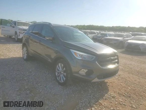 2017 Ford Escape Titanium with VIN 1FMCU0J92HUA37355, listed as a Copart auction lot 52365875 with 82,651 mi miles and Salvage Title. Bid and sale history available at carsss.com. Image 15.