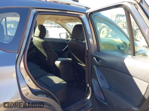 2013 Mazda CX-5 Sport z VIN JM3KE4BE3D0141748, wystawiony jako IAAI lot #41836498 z przebiegiem 163 118 mil mil oraz . Historia ofert i sprzedaży dostępna na DreamBid. Obrazek 8.