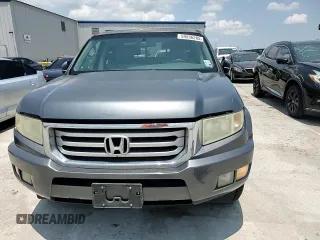 2012 Honda Ridgeline RTL z VIN 5FPYK1F54CB451175, wystawiony jako Copart lot #59536285 z przebiegiem 160 476 mil mil oraz Szkoda całkowita • Salvage title. Historia ofert i sprzedaży dostępna na DreamBid. Obrazek 13.