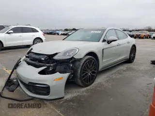 2021 Porsche Panamera с VIN WP0AJ2A75ML120017, выставлен на аукционе Copart как лот 81517913 с пробегом 26 083 миль миль и . История ставок и продаж доступна на DreamBid. Изображение 1.