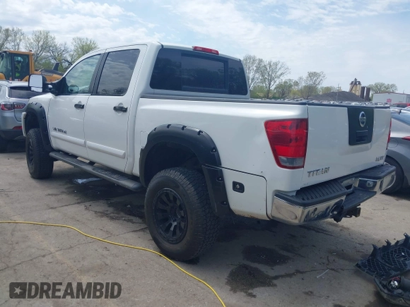 2005 Nissan Titan LE with VIN 1N6AA07BX5N525048, listed as a IAAI auction lot 41984150 with 242,321 mi miles. Bid and sale history available at carsss.com. Image 3.