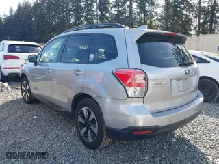 2018 Subaru Forester Premium with VIN JF2SJAGC6JH585182, listed as a IAAI auction lot 42043236 with 64,420 mi miles. Bid and sale history available at carsss.com. Image 3.