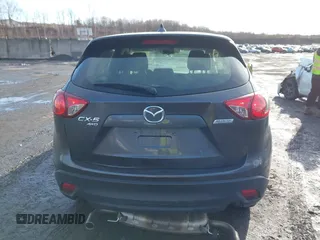 2015 Mazda CX-5 Sport with VIN JM3KE4BY1F0543507, listed as a IAAI auction lot 41530491 with 127,995 mi miles. Bid and sale history available at carsss.com. Image 16.
