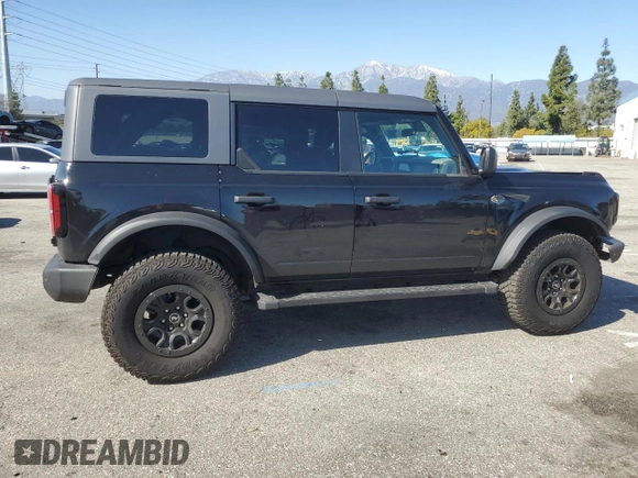 2024 Ford Bronco Wildtrak z VIN 1FMEE2BP1RLA54539, wystawiony jako Copart lot #46310905 z przebiegiem 12 545 mil mil oraz Szkody całkowita. Historia ofert i sprzedaży dostępna na DreamBid. Obrazek 3.