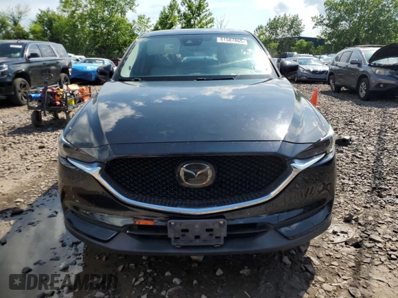 2018 Mazda CX-5 Grand Touring with VIN JM3KFBDM6J0345848, listed as a Copart auction lot 61587865 with 107,193 mi miles and Salvage title. Bid and sale history available at DreamBid. Image 5.