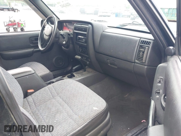 2000 Jeep Cherokee with VIN 1J4FF48S5YL182045, listed as a IAAI auction lot 42262612 with 192,292 mi miles and . Bid and sale history available at DreamBid. Image 5.