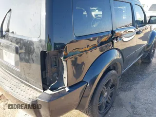 2007 Dodge Nitro SLT with VIN 1D8GT58K97W666680, listed as a IAAI auction lot 41573904 with 171,795 mi miles. Bid and sale history available at carsss.com. Image 12.