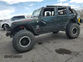 2012 Jeep Wrangler Unlimited Rubicon with VIN 1C4HJWFG4CL103531, listed as a Copart auction lot 48131665 with 183,234 mi miles and Salvage title. Bid and sale history available at DreamBid. Image 1.