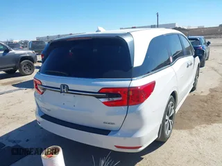 2023 Honda Odyssey Touring with VIN 5FNRL6H88PB003865, listed as a IAAI auction lot 41715384 with 40,765 mi miles and . Bid and sale history available at DreamBid. Image 4.