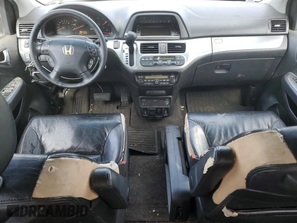 2008 Honda Odyssey Touring with VIN 5FNRL38998B052646, listed as a Copart auction lot 58357145 with 200,943 mi miles and Salvage title. Bid and sale history available at DreamBid. Image 8.