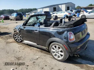 2012 MINI Convertible S with VIN WMWZP3C54CT296796, listed as a Copart auction lot 72209604 with 90,864 mi miles and Salvage title. Bid and sale history available at DreamBid. Image 2.