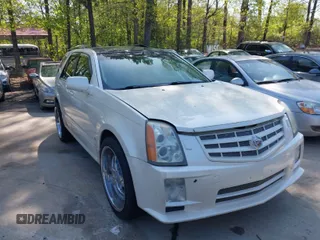 2008 Cadillac SRX with VIN 1GYEE63A480108836, listed as a IAAI auction lot 41993953 with 135,254 mi miles. Bid and sale history available at carsss.com. Image 1.